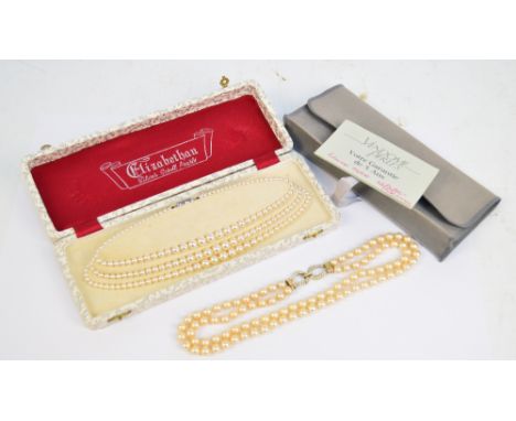 A simulated pearl necklace, the graduated beads in three strings, shortest length 36cm, boxed and a further double strand pea
