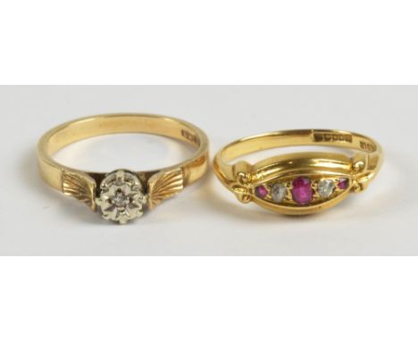 An early 20th century 18ct yellow gold ruby and diamond ring, the navette shaped platform set with five graduated stones, the