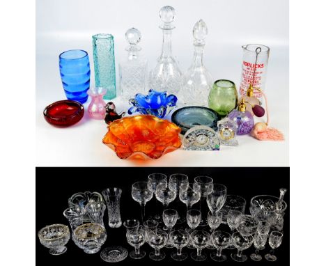 A group of glass to include clear cut glass decanters and various drinking glasses, and decorative glass to include a carniva