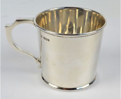 COOPER BROS & SONS; a George V hallmarked silver christening mug of tapering form with angled handle, Sheffield 1922, height 