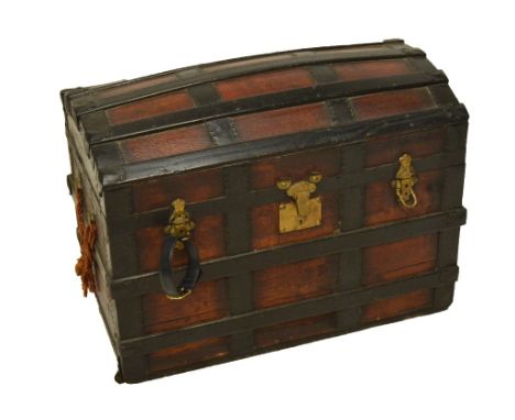 An early 20th century staple work decorated trunk with domed lid and twin handles, 77 x 46cm.