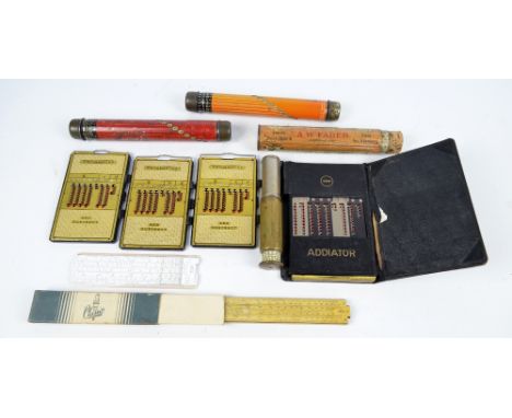 Two Solely British made "Darnley's Patent Rotatable Lightning Calculator Pencil Case, Rule & Measure", a similar German examp