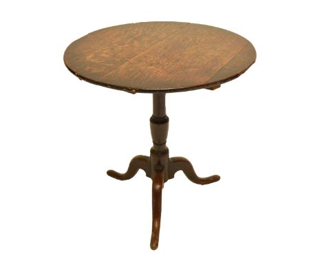 A George III oak tripod occasional table, diameter 65cm.