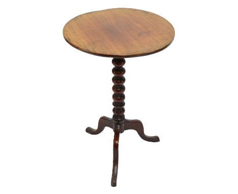 A Victorian mahogany circular tilt top occasional table raised on bobbin turned central column to three outswept supports, di