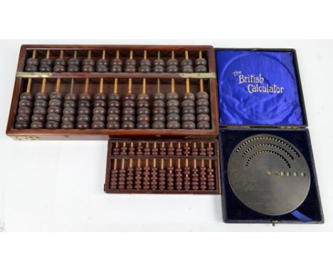 A cased "The British Calculator (model B)" for Compound Edition, a large abacus and a small abacus (3).