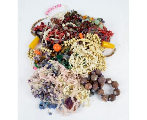 A large quantity of hardstone and freshwater pearl necklaces, bracelets, etc.
