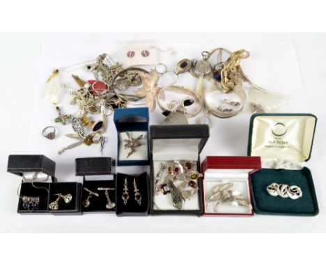 A quantity of silver and white metal bracelets, brooches and necklaces, including a pair of silver stamped 925 stone set drop