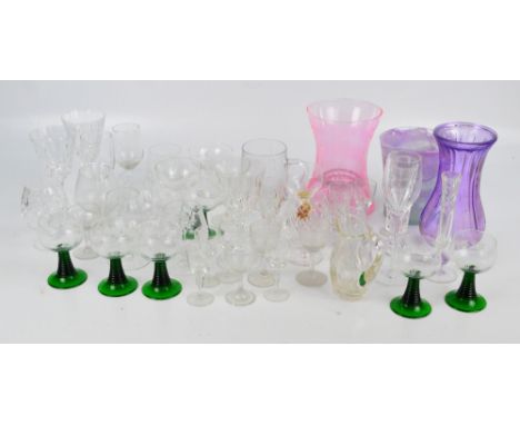 A mixed quantity of glass ware to include coloured vases, drinking glasses, brandy glasses, etc.