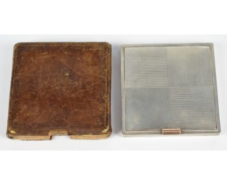 DAVID SUTTON & SONS; a George VI hallmarked silver Art Deco style square powder compact with release action yellow metal thum