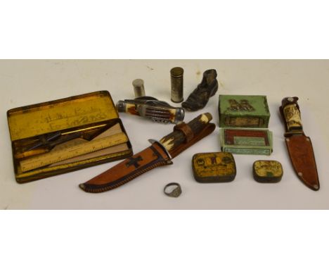 A mixed lot of collectors' items to include an antler handled folding combination knife, fork, spoon, bottle opener and corks