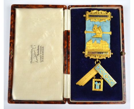 A 1930s 18ct Masonic jewel, Holte Lodge No.1246, centred with a squirrel with a diamond set eye above buildings, suspending a