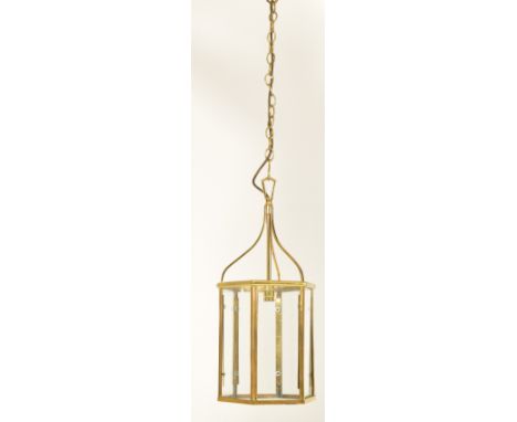 A George III Revival brass &amp; glass hexagonal hall porch ceiling lantern light. The light having bent metal tripod arms wi