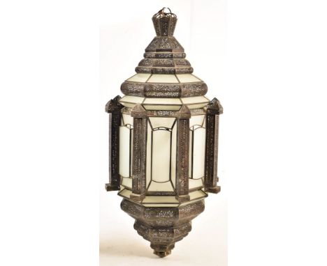 A large Islamic inspired pierced metal &amp; glazed Mosque temple ceiling lantern light. The lantern of faceted form with lea