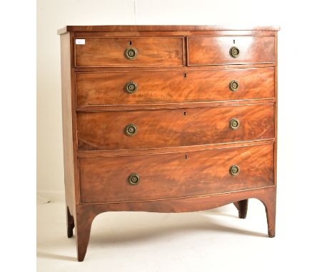 A George III early 19th century flame mahogany bow fronted chest of drawers. The chest having a straight top over a bank of t