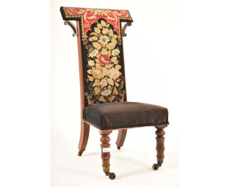 A Victorian 19th century mahogany prayer / prie dieu chair. The chair having a blue velour overstuffed seat with tapestry bac