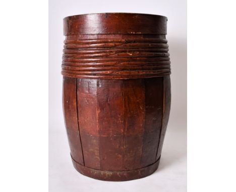A large 19th century Victorian shipping spice barrel of slatted wood construction with circular lid, bulbous body and painted