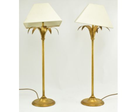 Porta Romana - A pair of toleware style gilded metal palm shaped desk table lamps. Each lamp having a conical cream shade ove