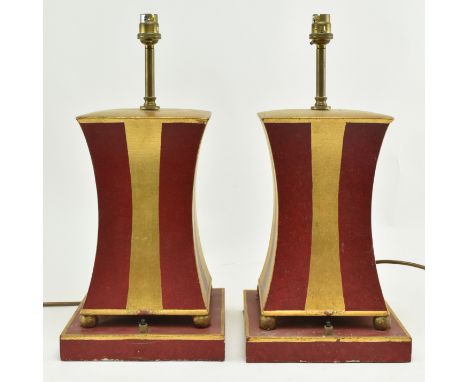 Porta Romana - A pair of gold &amp; red painted geometric desk table lamps. Each lamp with a brass light arm over a splayed c