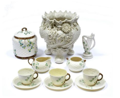 A model of an Irish Belleek harp black Fermanagh mark, 15cm, a Belleek basket-weave biscuit barrel and cover with clover deco