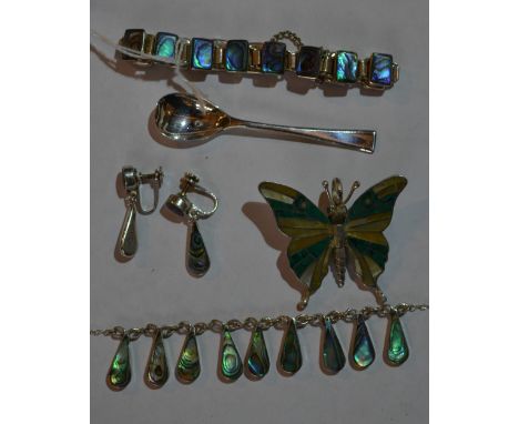 A small collection of miscellaneous Paua shell New Zealand silver jewellery including a butterfly with malachite and mother o
