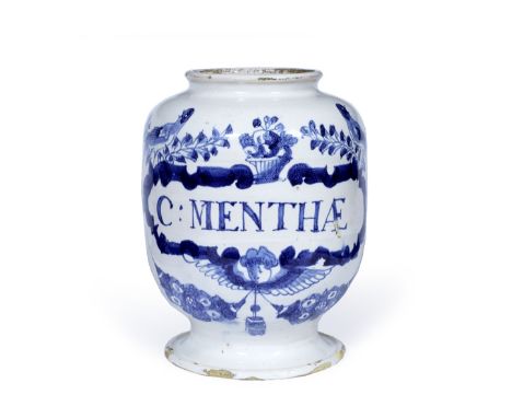 A Delftware drug jar,Lambeth early 18th Century having a blue cartouche inscribed C Menthae, 20cm high