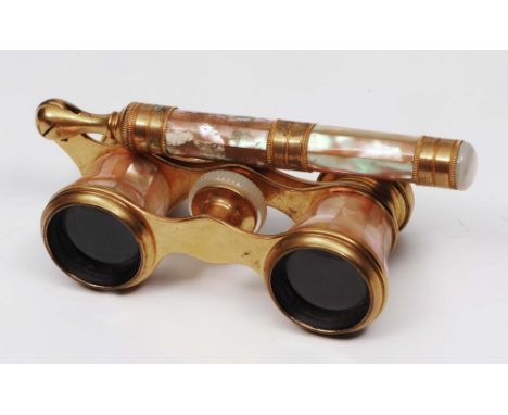 A pair of French opera glasses with mother of pearl and gilt decoration by Iris of Paris