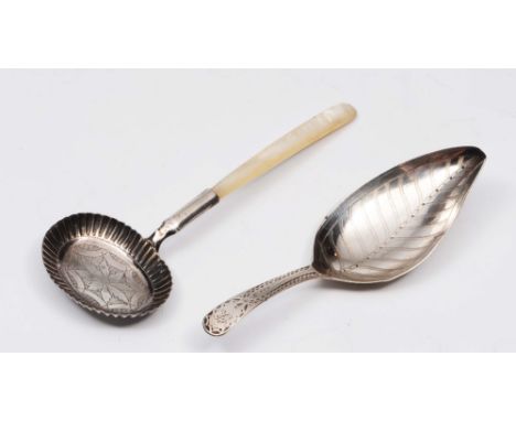 An early 19th Century silver and mother-of-pearl caddy spoon the oval bowl with crimped edge and chased decoration, Birmingha