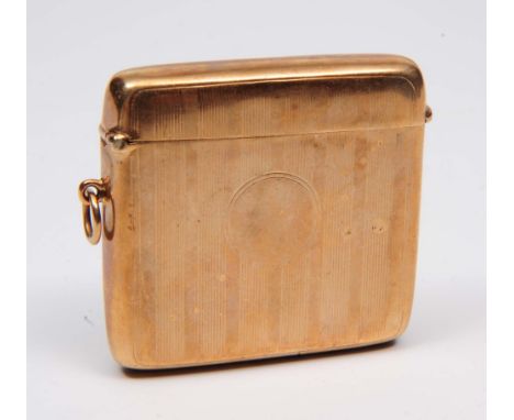 A 9ct gold vesta box with engine turned decoration 29.6 grams