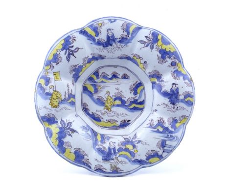 A Delftware lobed dish possibly Frankfurt 1680-1700 in the Ming 17th Century style decorated in manganese, blue and yellow wi