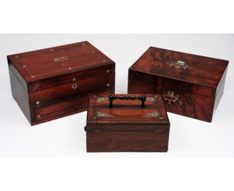 A Victorian rosewood folding desk box with mother of pearl inlay 24cm, a Victorian walnut workbox dated 1873 31cm and one oth