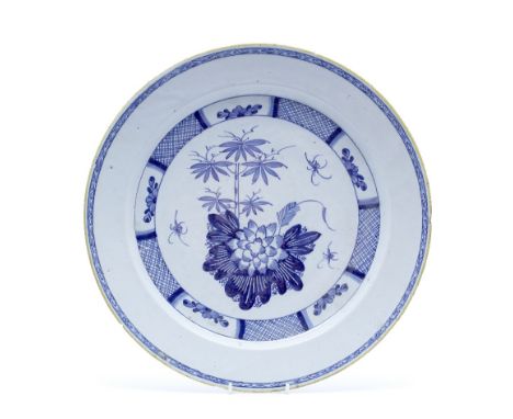 A Delftware charger Liverpool, circa 1760 simple blue Chinese flower design within a chequered border, 34cm