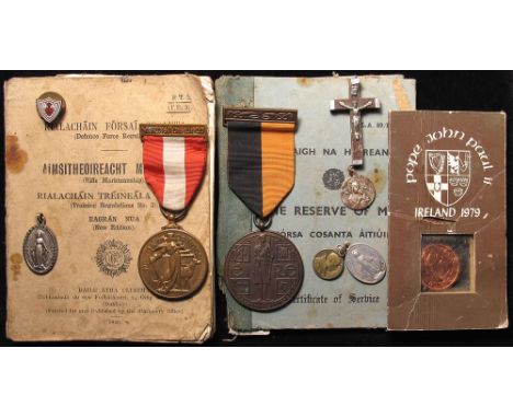 Irish group attributed to 634938 S Q M S John Doherty who enlisted in The Reserve of Men 28/3/1946, Discharged 27/3/1951. Lot