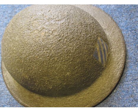 WW1 US brodie pattern helmet nice example with dive patch on the front complete with lining and chin strap