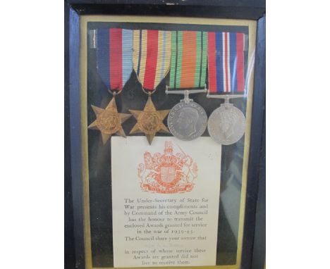 WW2 officers casualty 1939-45 star, Africa star, defence and war medals in frame with casualty medal slip to major john altha