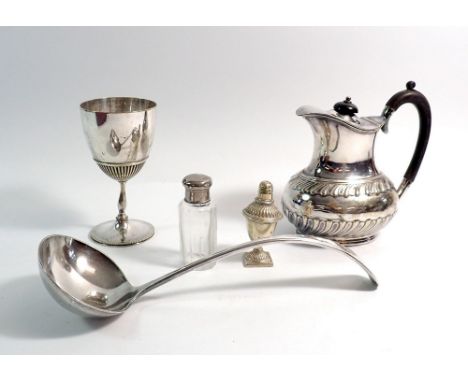 A silver plated ladle and other silver plated items 