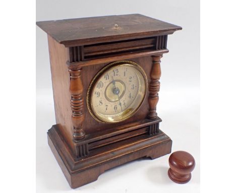 An early 20th century Junghans German alarm clock in a wooden case, 15.5cm wide 