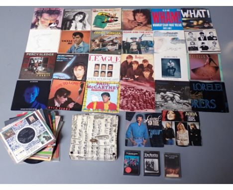 A collection of vinyl single records including The Beatles, Wham, Percy Sledge, Elvis etc. and three music cassettes includin