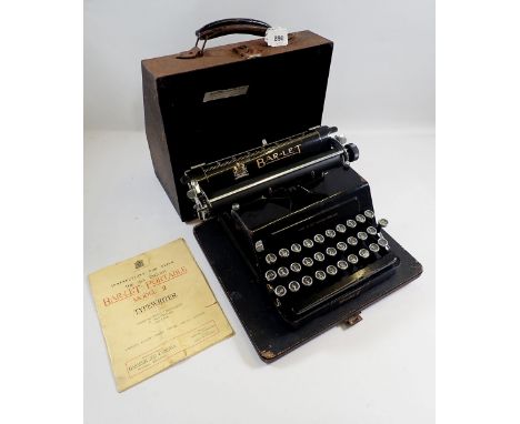 An antique Bar-Let portable model 2 typewriter with case and manual 