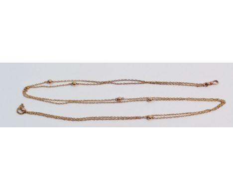 A 9 carat gold fob chain with interspersed ball decoration, 13g approx 135cm long 