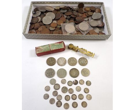A group of pre-decimal British coins including silver content pre 47, total weight 116g pre 20 14g plus a sovereign scale - C