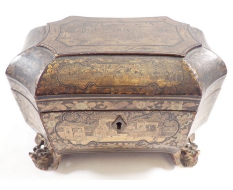 A late 19th century Chinese black and gilt lacquer tea caddy decorated landscape and figure scenes, fitted pewter caddies wit