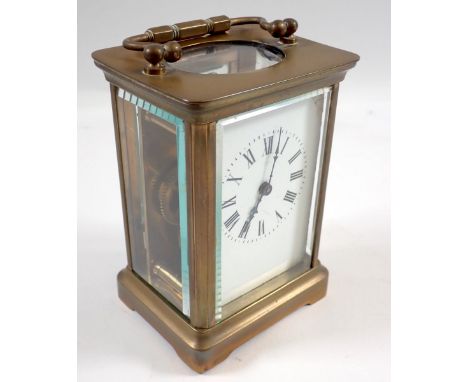 A French brass eight day carriage clock with key 