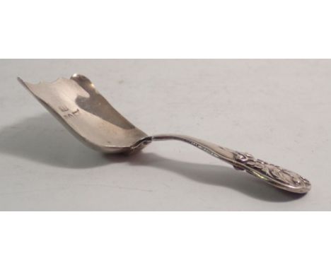 A Victorian silver caddy spoon with tulip shaped bowl and foliate decoration to terminal, Birmingham 1851 by Thomas Dones 