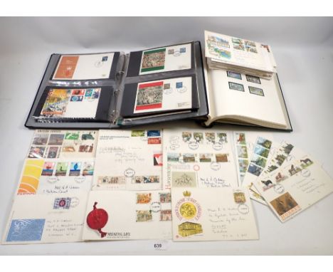 A quantity of First Day Covers 1970's and 1980's plus stamp album 