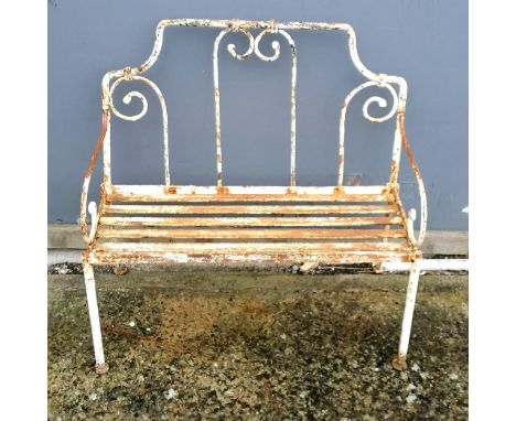 Antique wrought iron child's bench with strap work seat 57cm high x 57cm wide x 24cm deep - in weathered condition