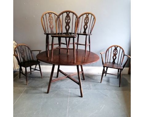 Ercol drop flap circular dining table and 5 chairs - 124cm x 112cm x 71cm