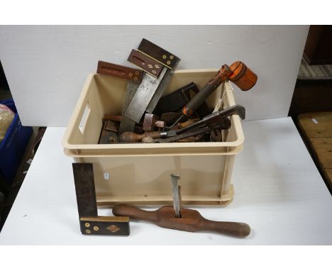 A collection of vintage tools to include set squares, spoke shaves and a selection of mechanics spanners. 