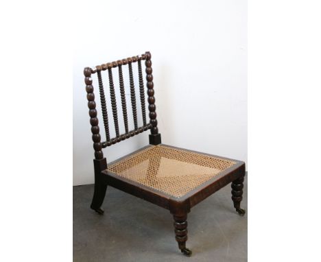 Victorian ebonised Bobbin turned low Chair 