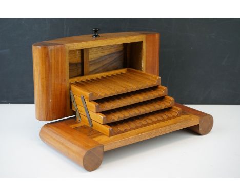 A vintage 1950's wooden cigarette box with space for 48 cigarettes. 