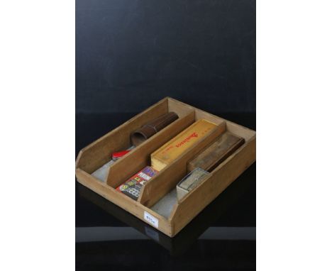 Box of items to include two sets of Dominoes, Playing Cards, Pen Knives and Beakers with Dice 